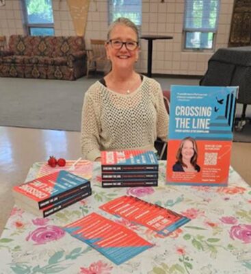 Photo of Sandra Towle with books 